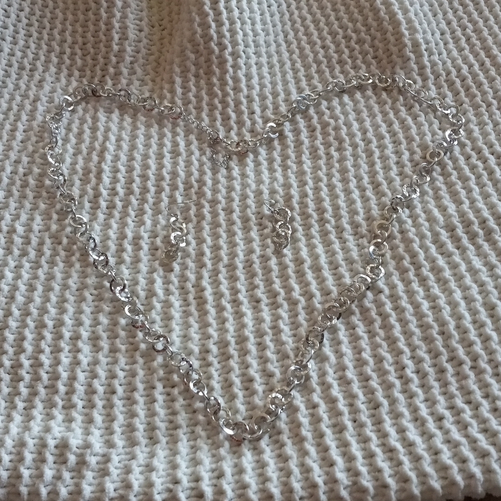 Gorgeous long silver color plated necklace with matching earrings